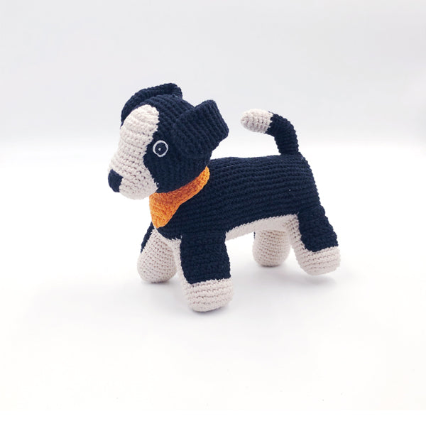Handmade knitted sheep dog made with 100% organic cotton. Black + white with orange collar. 