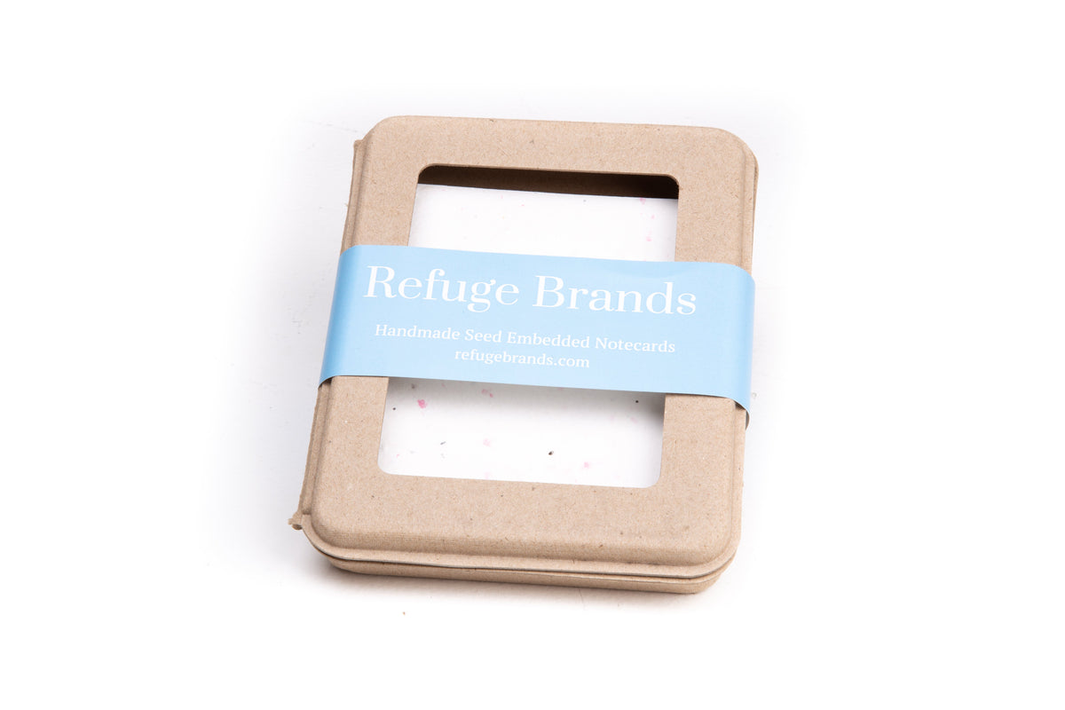Refuge Brands handmade seed embedded cards are infused with wildflower or poppy seeds. Eco-friendly. 100% recycled ingredients, biodegradable, non-invasive and non-GMO seeds; Plant in potting soil for flowers to grow. Package of five cards + five recycled envelopes.