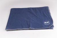 Load image into Gallery viewer, Fleece blankets made with 55% BCI cotton + 45% rPet from recycled bottles. 50” X 70&quot; 
