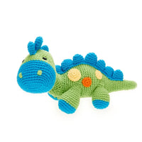 Load image into Gallery viewer, A stegosaurus dinosaur  cotton knit toy. Featuring delicate little stitched details, this charming crochet dinosaur has a  rattle . Green Steggy.
