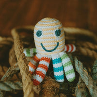 Load image into Gallery viewer, A happy little sea creature is a little hands&#39; favorite! Our organic rainbow octopus rattle is colorful.
