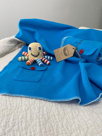 Load image into Gallery viewer, A happy little sea creature is a little hands&#39; favorite! Our organic rainbow octopus rattle is colorful. Shown as part of gift set.
