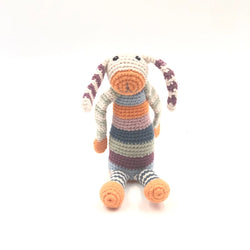 Our floppy-eared, multi-striped rainbow bunny has to be the brightest rattle in town! Featuring all the colors in our organic cotton range, he’s fun, friendly and fully machine-washable. Hand-knitted 